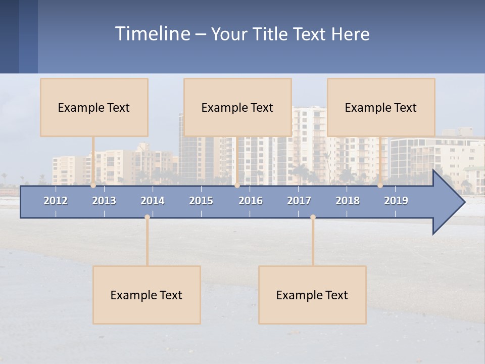 A Sandy Beach With Buildings In The Background PowerPoint Template