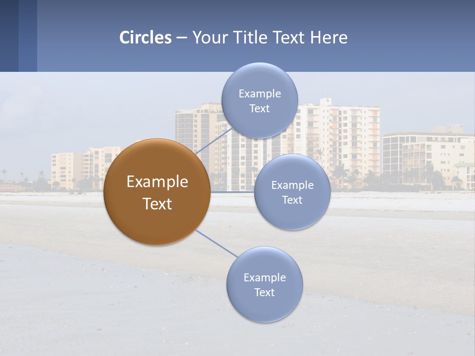 A Sandy Beach With Buildings In The Background PowerPoint Template