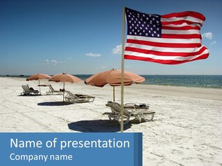 An American Flag On A Beach With Lounge Chairs And Umbrellas PowerPoint Template
