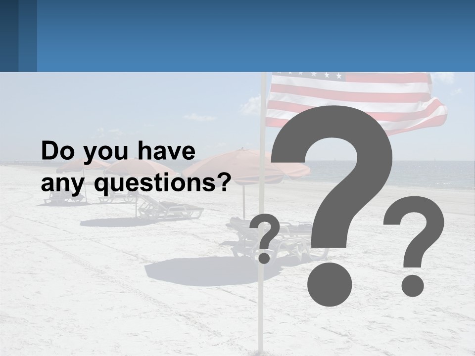 An American Flag On A Beach With Lounge Chairs And Umbrellas PowerPoint Template