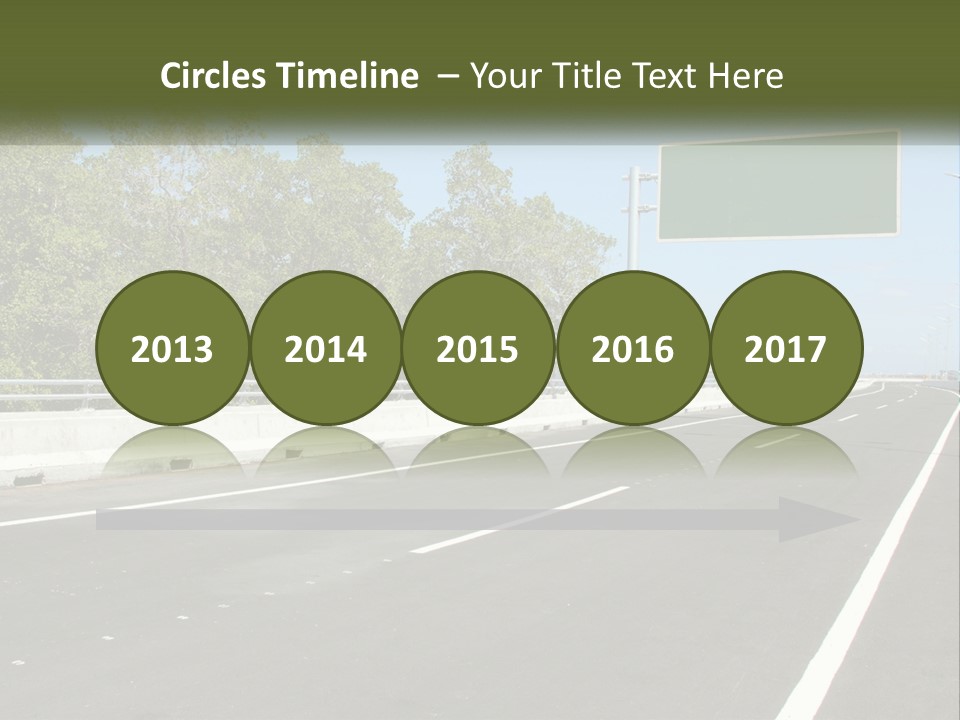 A Highway With A Green Sign On The Side Of It PowerPoint Template