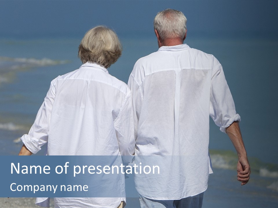 A Man And A Woman Walking Along The Beach PowerPoint Template