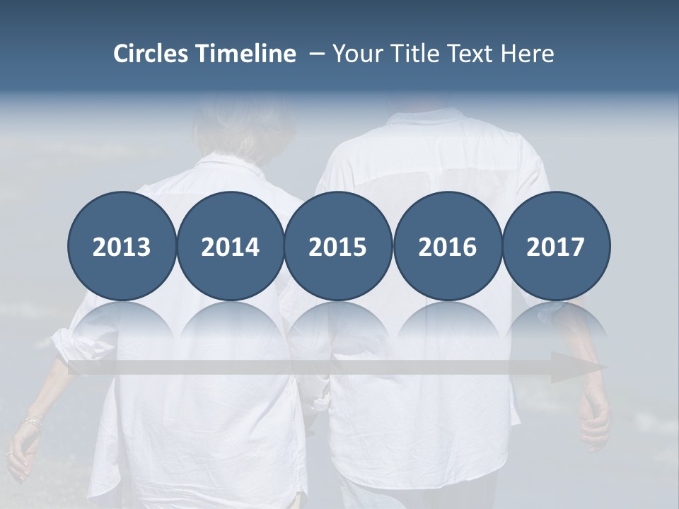 A Man And A Woman Walking Along The Beach PowerPoint Template