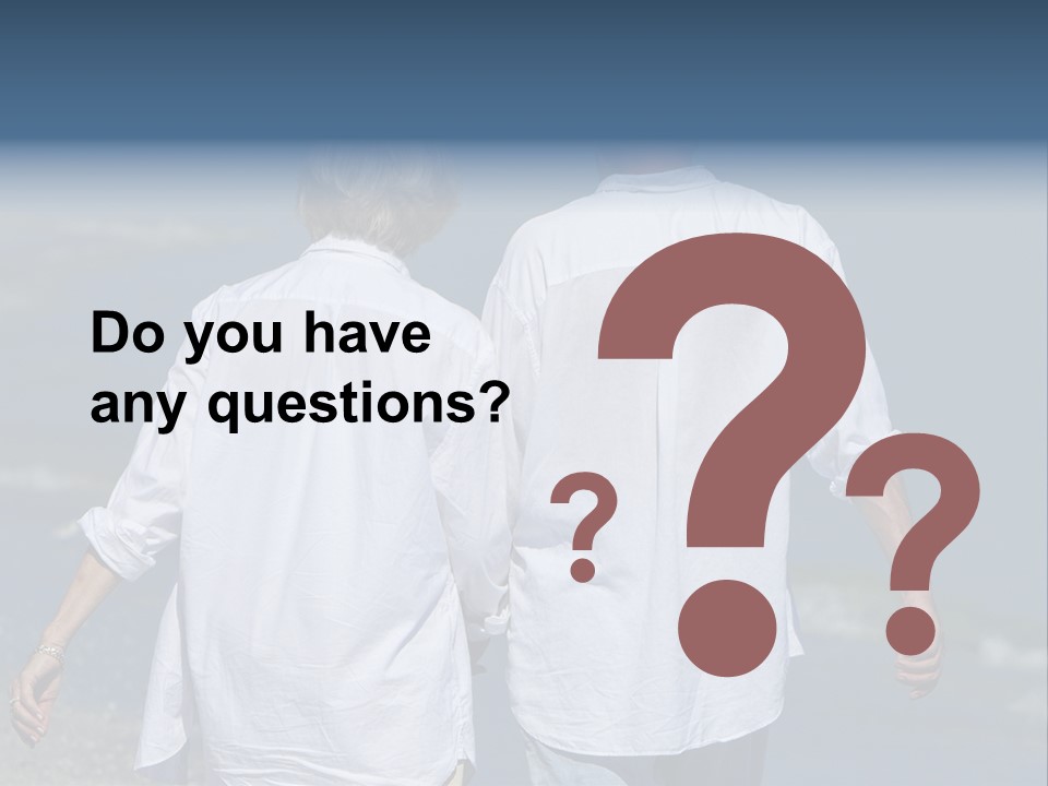 A Man And A Woman Walking Along The Beach PowerPoint Template