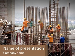 A Group Of Construction Workers Working On A Building PowerPoint Template
