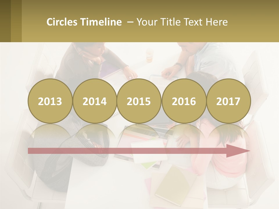 A Group Of People Sitting Around A White Table PowerPoint Template