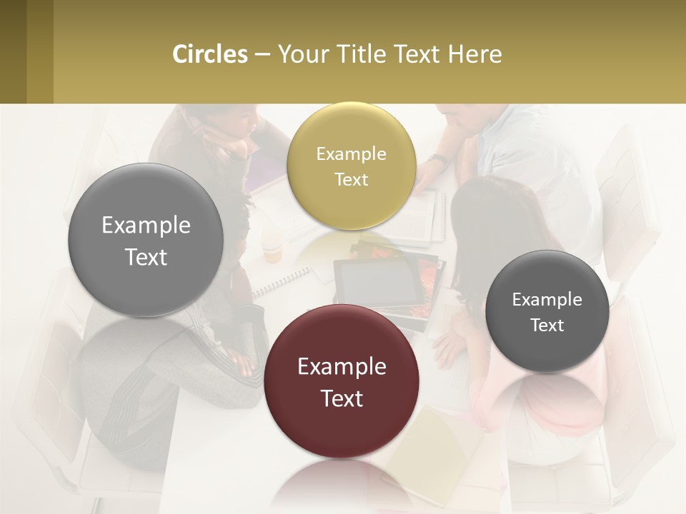 A Group Of People Sitting Around A White Table PowerPoint Template