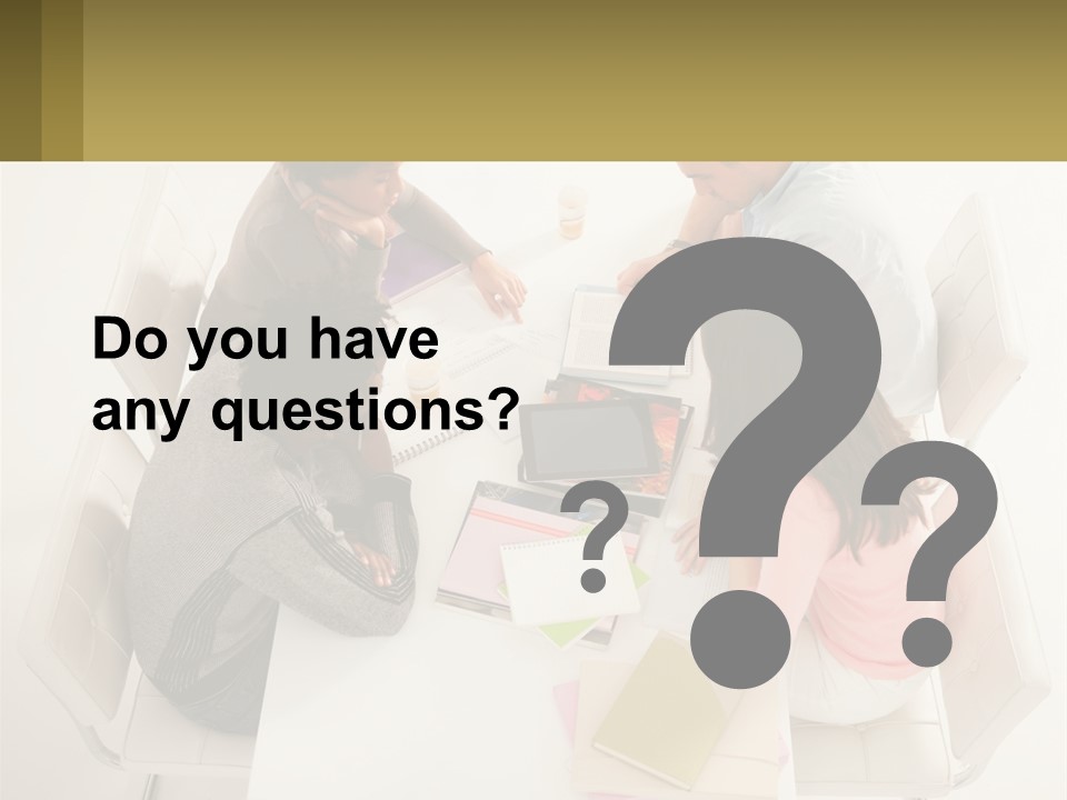 A Group Of People Sitting Around A White Table PowerPoint Template