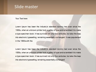 A Person Holding Their Hand Up To The Sky PowerPoint Template