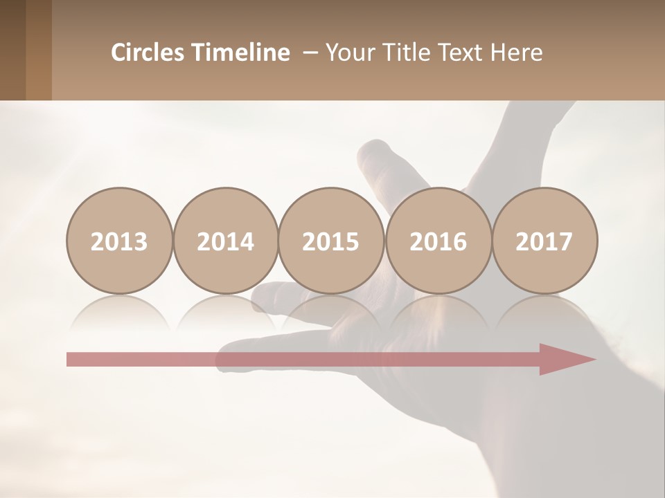 A Person Holding Their Hand Up To The Sky PowerPoint Template