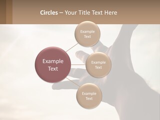 A Person Holding Their Hand Up To The Sky PowerPoint Template
