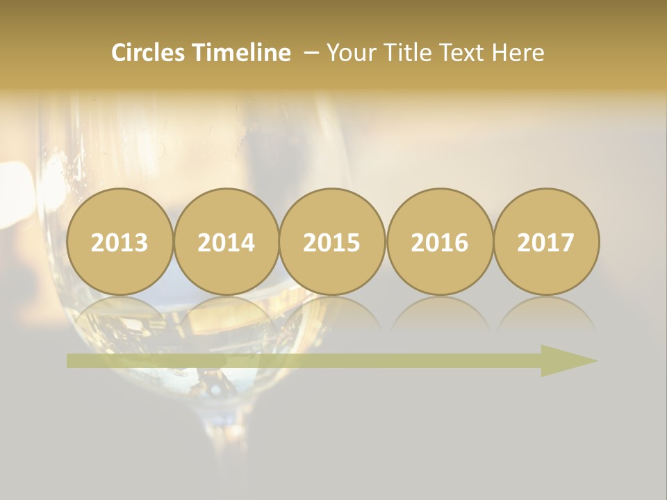 A Glass Of White Wine On A Table PowerPoint Template