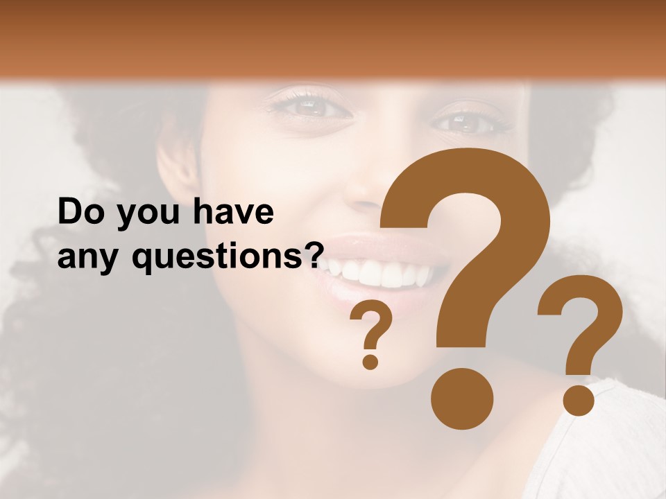 A Woman With Curly Hair Is Smiling For The Camera PowerPoint Template