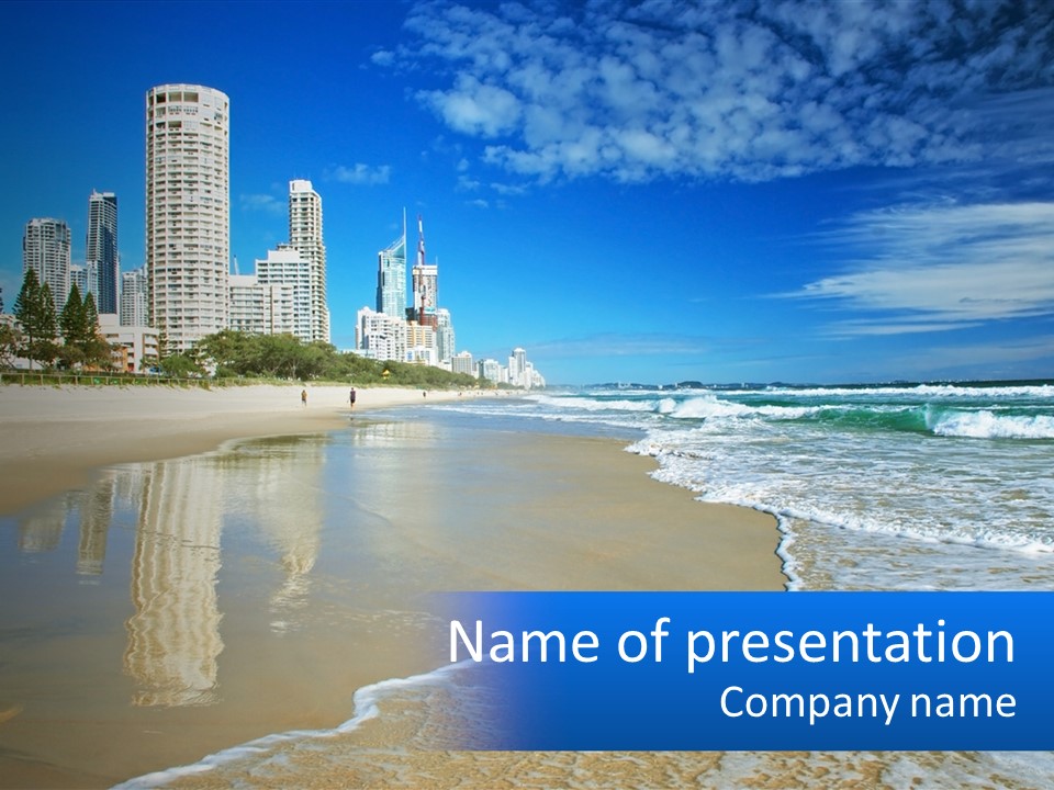 A Beach With A City In The Background PowerPoint Template