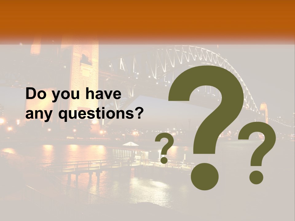 A Bridge Over A Body Of Water At Night PowerPoint Template