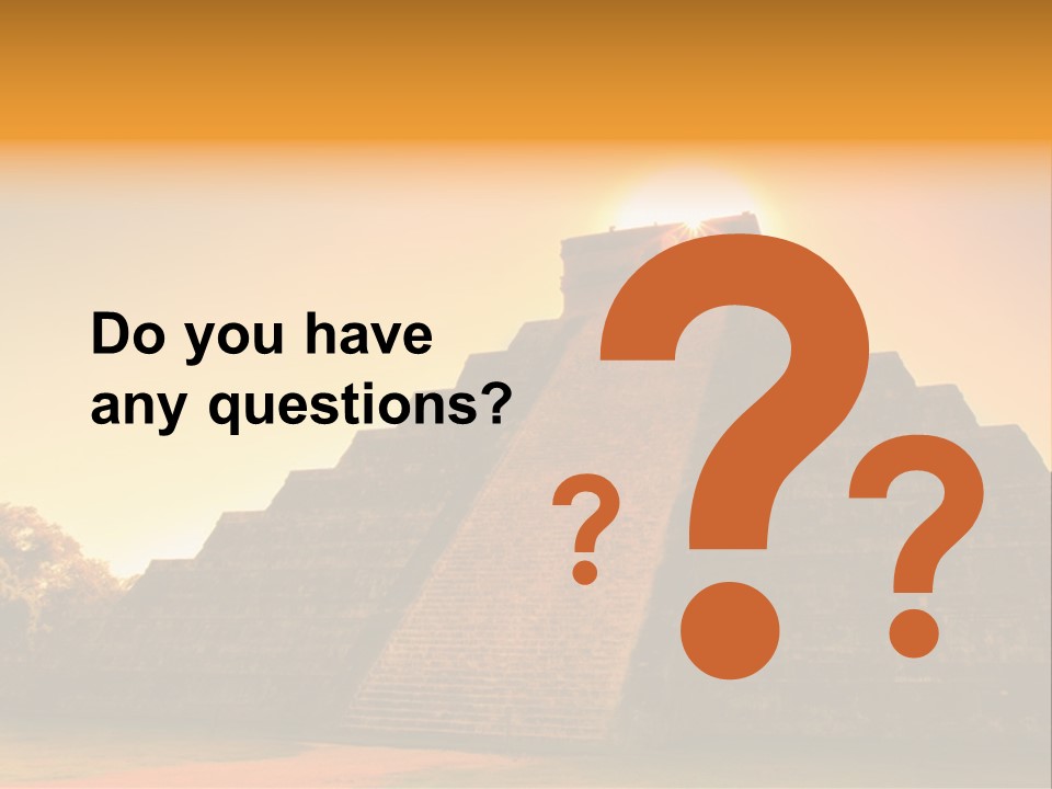 A Pyramid With The Sun Setting In The Background PowerPoint Template