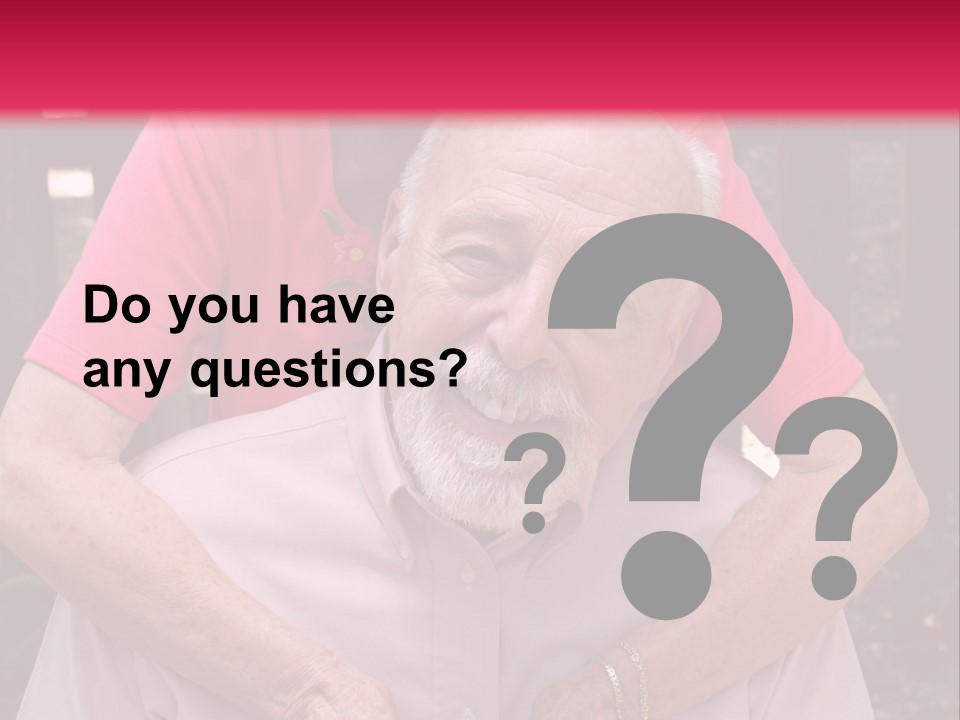 An Elderly Man And Woman Are Smiling For The Camera PowerPoint Template