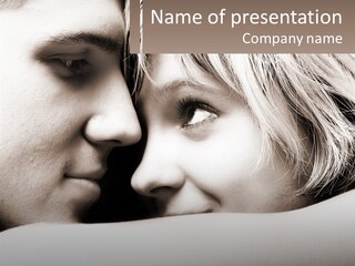 A Man And A Woman Are Looking Into Each Other's Eyes PowerPoint Template