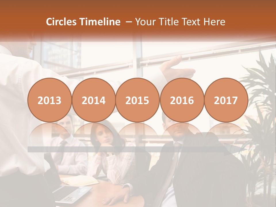 A Man Giving A Presentation To A Group Of People PowerPoint Template