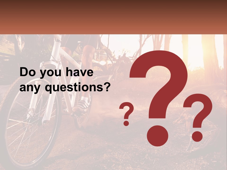 A Person Riding A Bike On A Dirt Road PowerPoint Template