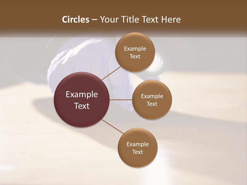 A Person Holding A Flashlight On Top Of A Wooden Table PowerPoint Template