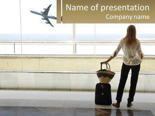 A Woman Standing In Front Of A Window With A Luggage Bag PowerPoint Template