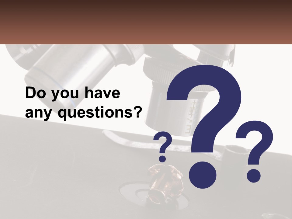 A Microscope And A Piece Of Chocolate On A Table PowerPoint Template