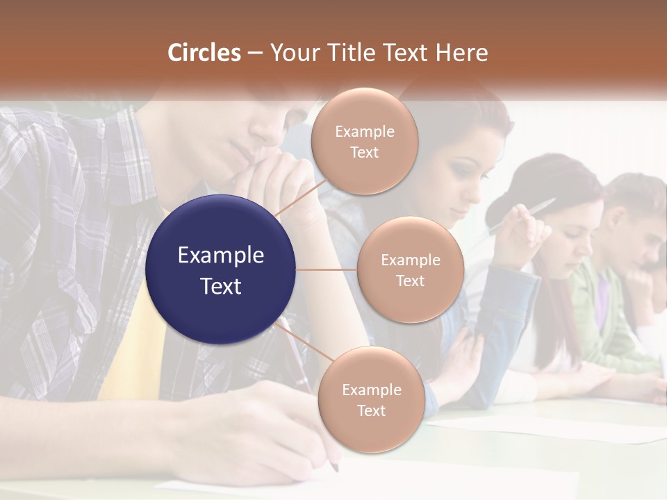 A Group Of People Sitting At A Table Writing PowerPoint Template