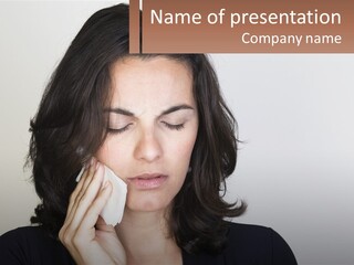 A Woman Holding A Phone Up To Her Face PowerPoint Template