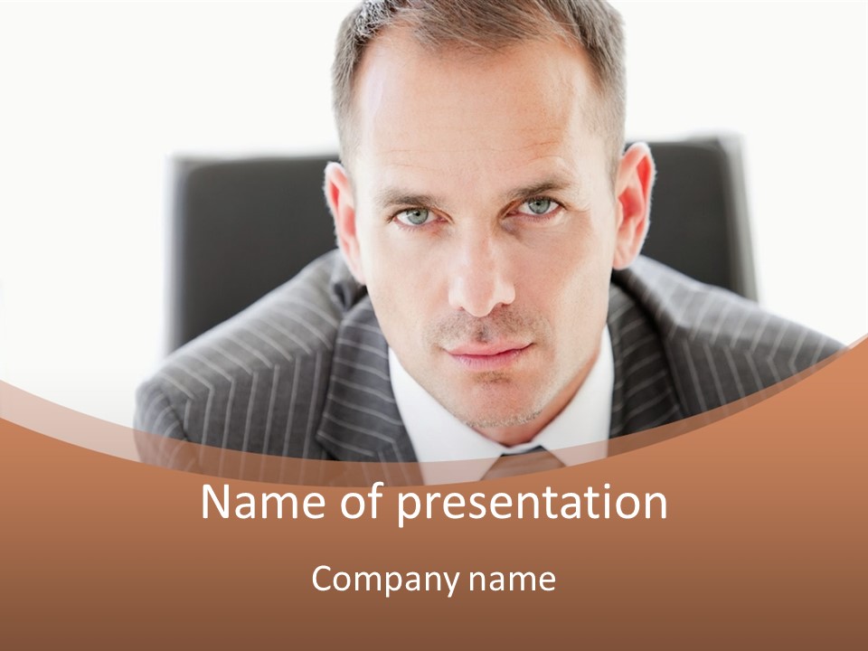 A Man In A Suit Is Looking At The Camera PowerPoint Template