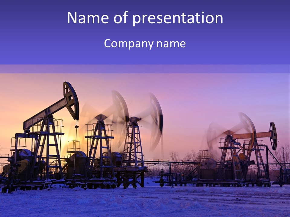 A Group Of Oil Pumps In The Snow PowerPoint Template