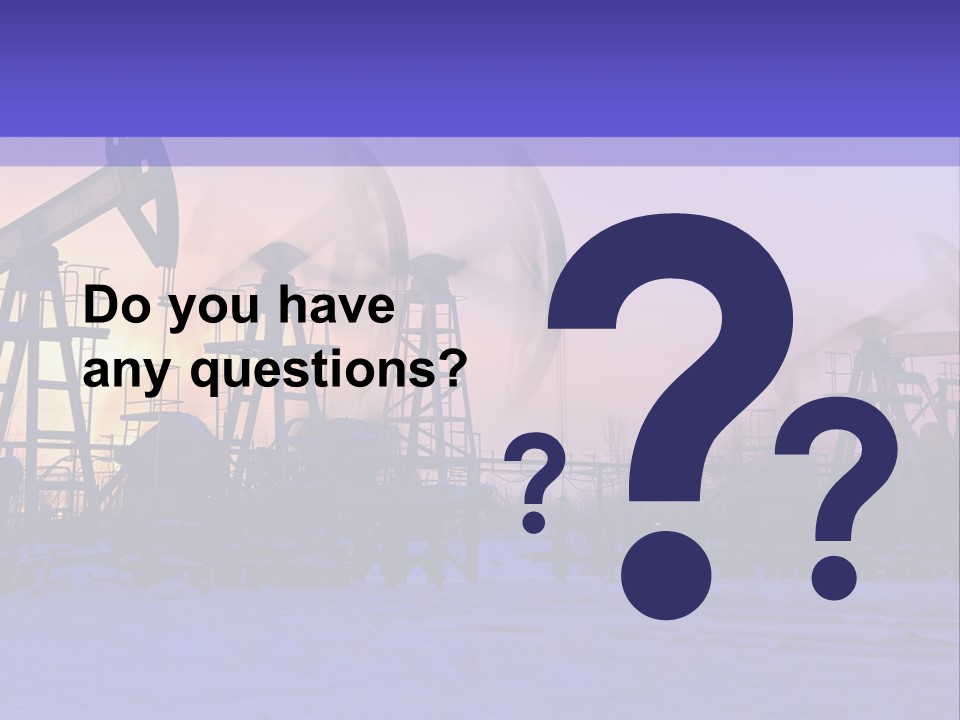 A Group Of Oil Pumps In The Snow PowerPoint Template