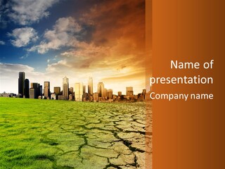 A Green Field With A City In The Background PowerPoint Template