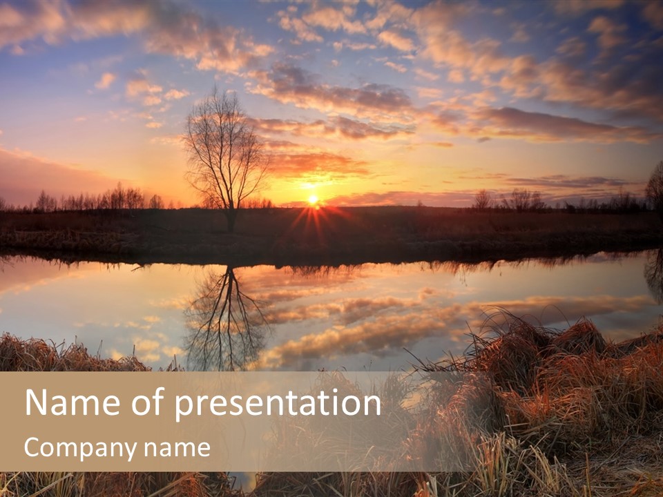 The Sun Is Setting Over A Body Of Water PowerPoint Template