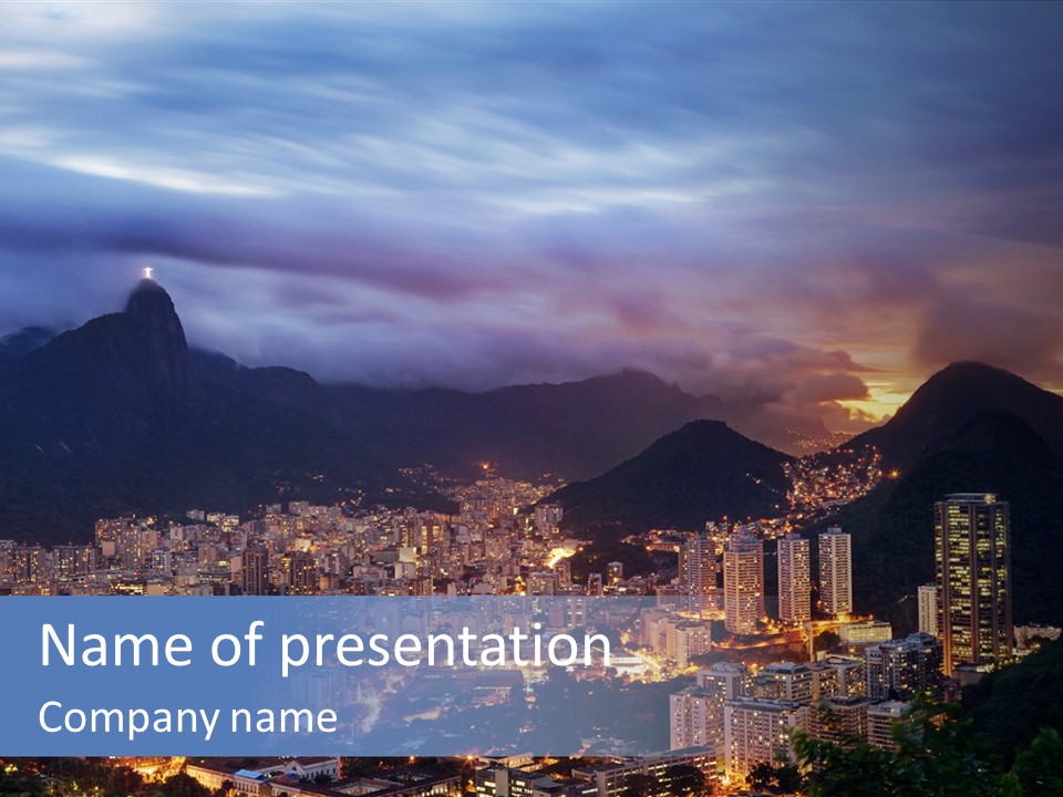 A Picture Of A City At Night With A Mountain In The Background PowerPoint Template