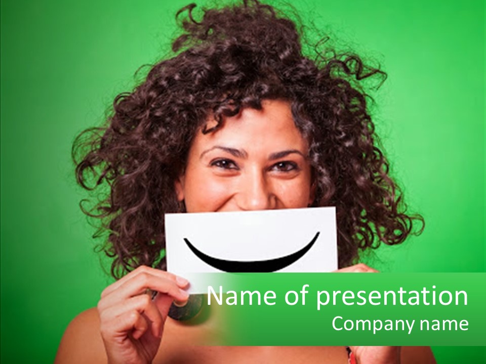A Woman Holding A Card With A Smiley Face On It PowerPoint Template