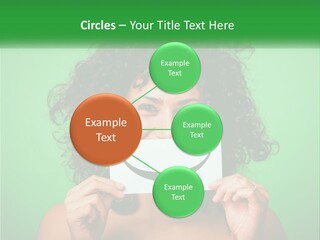 A Woman Holding A Card With A Smiley Face On It PowerPoint Template