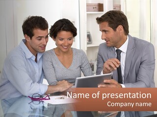 A Group Of People Sitting Around A Table Looking At A Tablet PowerPoint Template