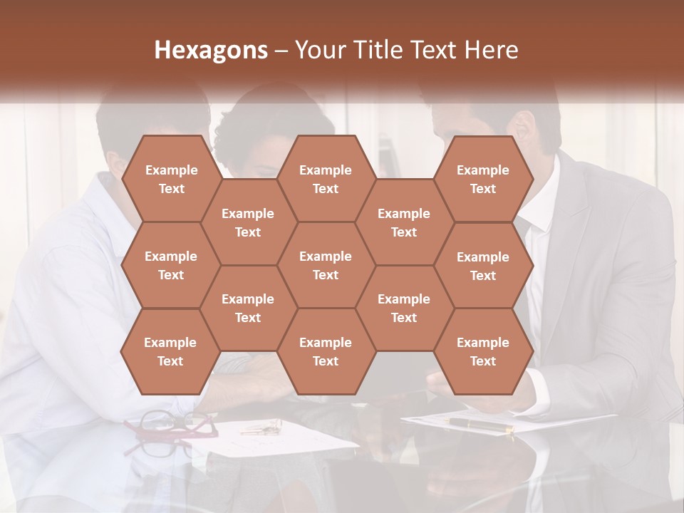 A Group Of People Sitting Around A Table Looking At A Tablet PowerPoint Template