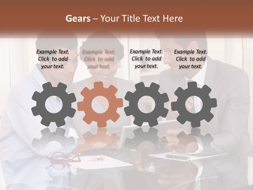 A Group Of People Sitting Around A Table Looking At A Tablet PowerPoint Template