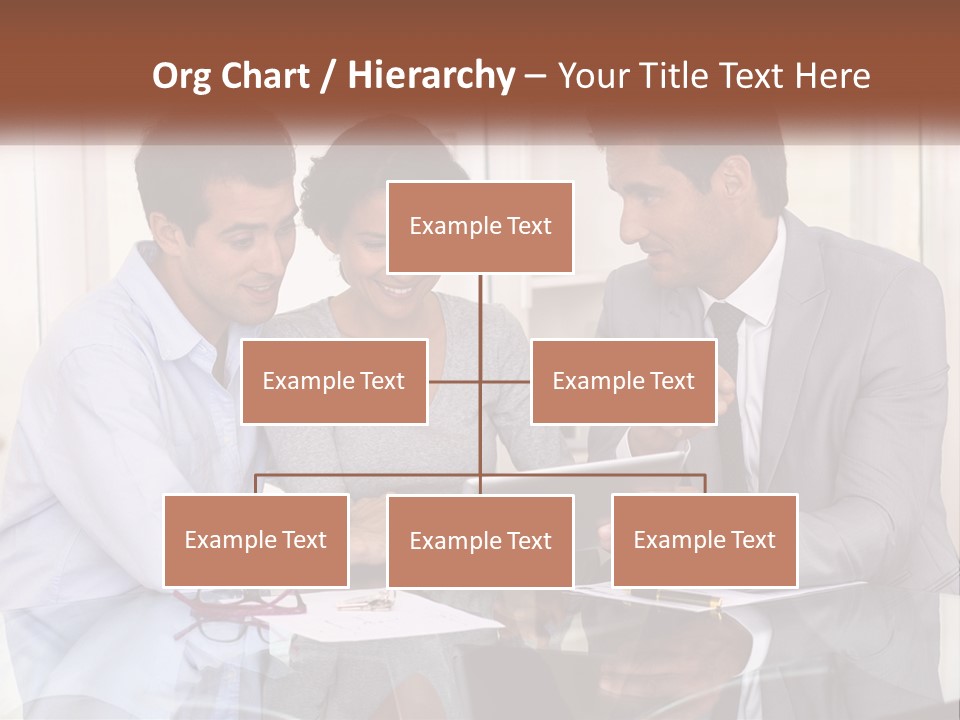A Group Of People Sitting Around A Table Looking At A Tablet PowerPoint Template