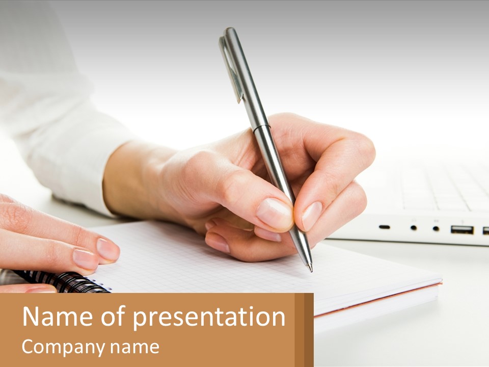 A Person Writing On A Piece Of Paper With A Pen PowerPoint Template