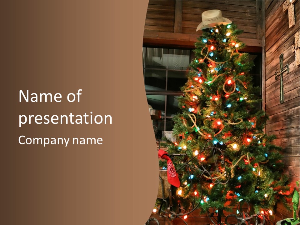 A Christmas Tree With Lights On It In Front Of A Window PowerPoint Template