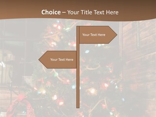 A Christmas Tree With Lights On It In Front Of A Window PowerPoint Template