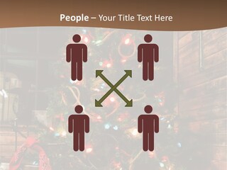 A Christmas Tree With Lights On It In Front Of A Window PowerPoint Template