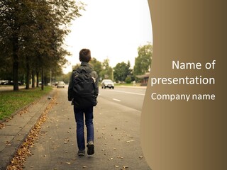 A Person Walking Down A Street With A Backpack PowerPoint Template