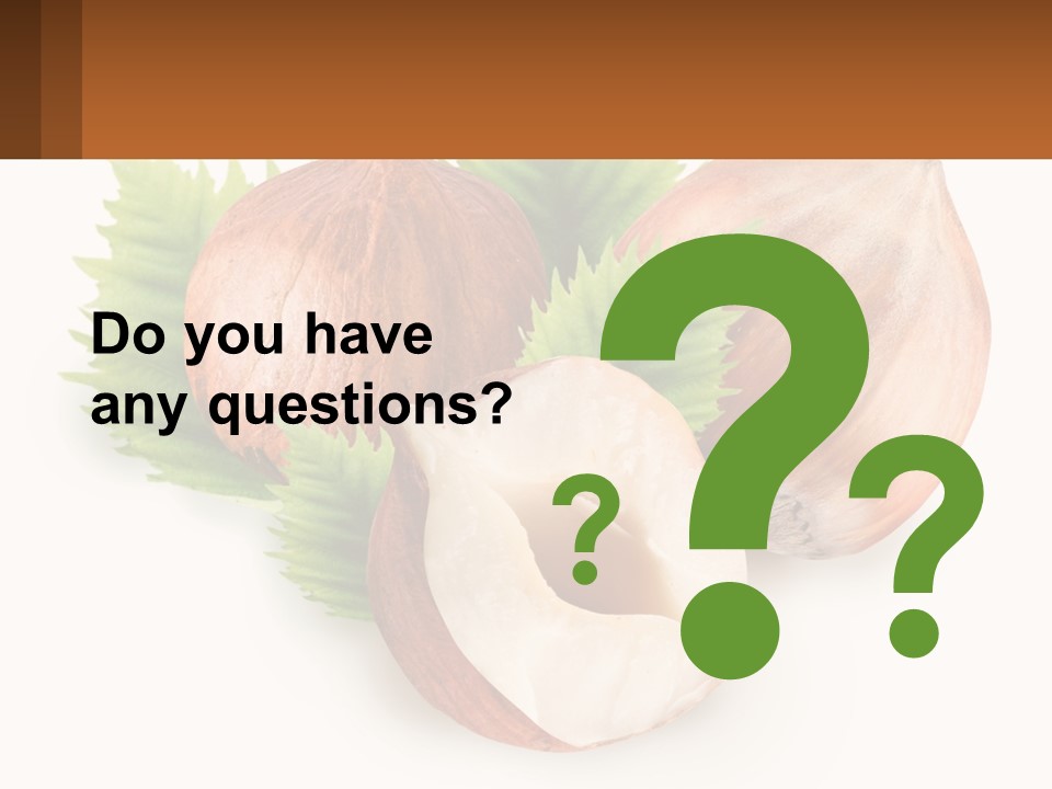 A Group Of Nuts With Leaves On A White Background PowerPoint Template