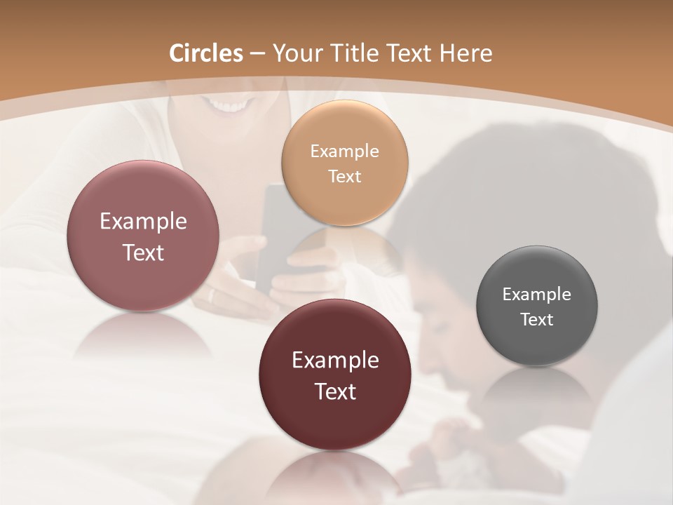 A Man And Woman Looking At A Cell Phone While Holding A Baby PowerPoint Template