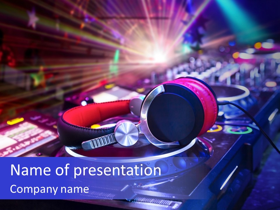 A Dj Mixer With Headphones On Top Of It PowerPoint Template