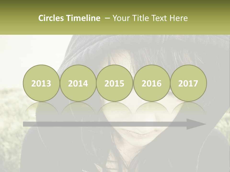 A Woman In A Hoodie Is Looking At The Camera PowerPoint Template